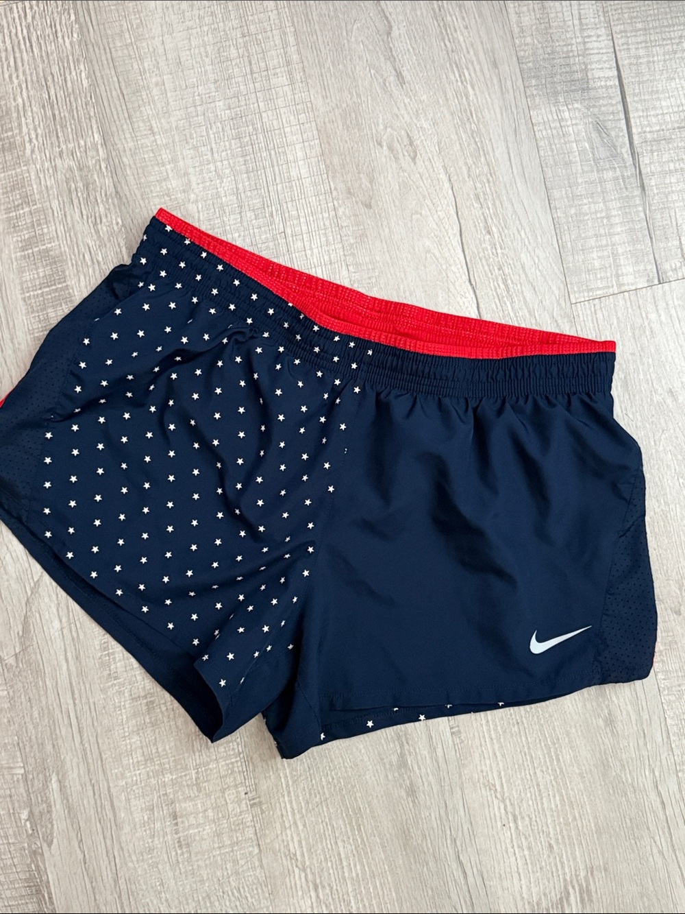 Nike Navy Shorts with Red Waistband and White Star Print